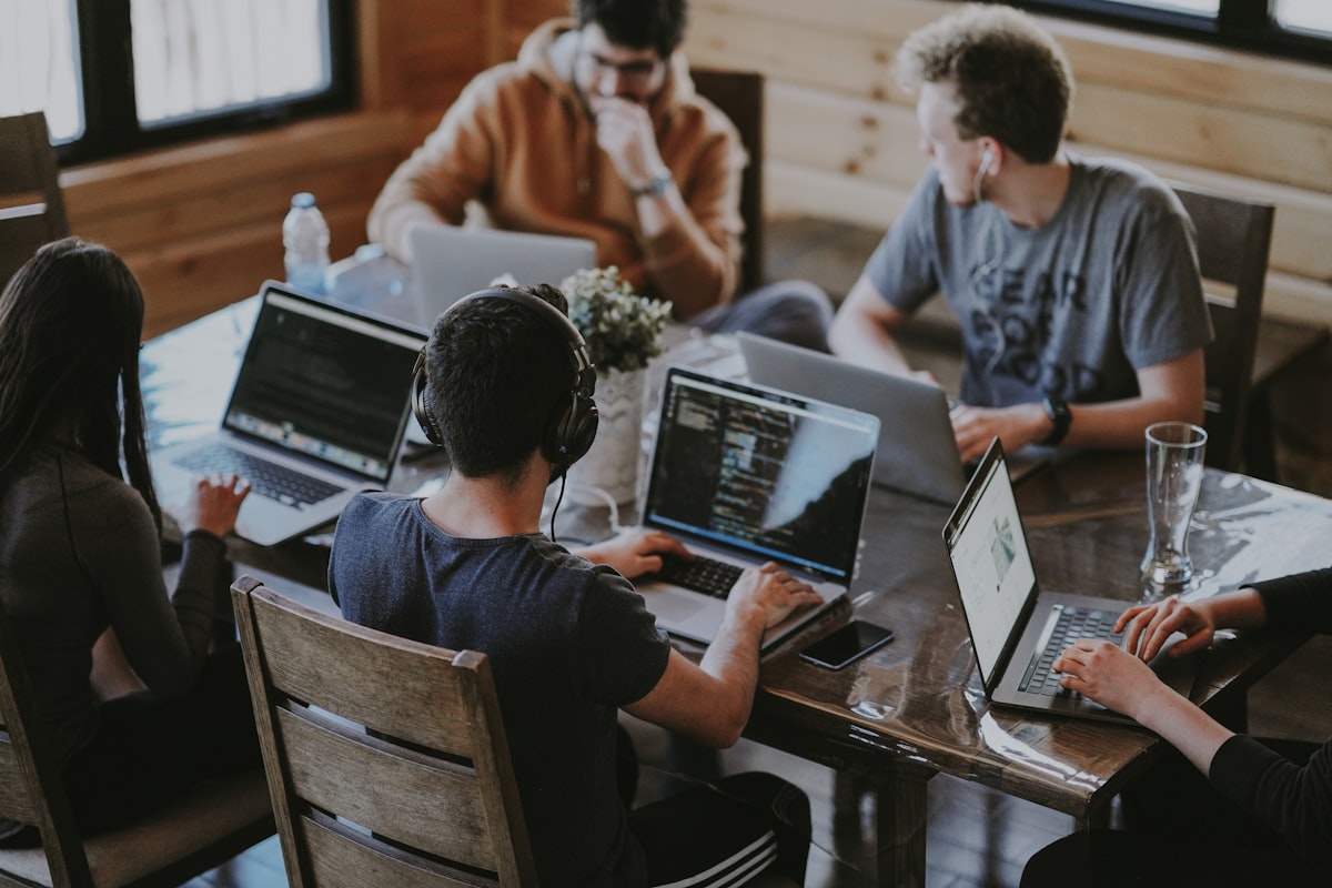 A hiring team working together around a table